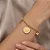 Pulseira 3 Pingente Coração E Religioso Folheado a Ouro 18K - Imagem 1
