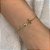 Pulseira Meninos Coração Vazado Folheado a Ouro 18K - Imagem 1