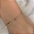 Pulseira Palitos Pingentes Cruz Folheado a Ouro 18K - Imagem 1