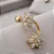 Piercing Cluster Duas Flores Cravejadas Folheado a Ouro 18k - Imagem 1