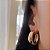 Brinco de Argola Grande Lisa Canoa Folheado a ouro 18K - Imagem 2