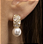 Brinco Pendente Cravejado e Pérola Folheado a ouro 18K - Imagem 1