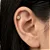 Piercing Florzinha Redonda Zircônia no Centro - Imagem 1