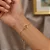 Pulseira Pingente Redondo Detalhes Diamantados - Imagem 1