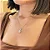Colar Redondo Com Zirconia Cristal Central e Borda Cravejada - Imagem 1