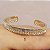 BRACELETE DOURADO INSPIRAÇÃO CARTIER CRAVEJADO - Imagem 1