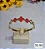 BRACELETE DOURADO AÇO INOX COM TREVOS VERMELHOS - Imagem 1