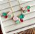 CONJUNTO PRATEADO COLAR E BRINCO BORBOLETA - Imagem 1