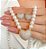 CONJUNTO DOURADO PÉROLAS COM CORAÇÃO CRAVEJADO - Imagem 1