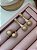 CONJUNTO DOURADO ANEL E BRINCOS CRAVEJADOS - Imagem 1