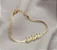PULSEIRA DOURADA FITA COM ROSAS - Imagem 1