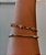 BRACELETE DOURADO CORAÇÃO COM ELO CRAVEJADO - Imagem 1