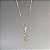 Pingente Cruz Trabalhada - Ouro 18k - Imagem 1