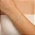 Pulseira Riviera Delicada com Coração Central Cristal • Banhado a Ouro - Imagem 2