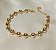 Pulseira Bolinhas Lisas e Tubinhos Banhada em Ouro 18 k. - Imagem 2