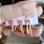 Trio de Brincos Retangulares Cravejadas com Zircônias Cristal Banhado em Ouro 18 k. - Imagem 2