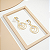 Brinco com Pedras de Zircônia Dourado - Imagem 1
