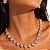 CONJUNTO COLAR E BRINCO CORAÇÃO CRAVEJADO ZIRCÔNIAS - Imagem 1