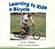 Learn To Ride A Bike - Board Book-.. - Imagem 1