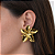 Brinco flor banhado a ouro 18k - Imagem 1