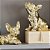 Conjunto de 2 Esculturas em Resina Cachorro Dourado 19x26cm e 25x23cm - Imagem 1
