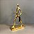 ESCULTURA DE CERAMICA HOMEM ANDANDO DOURADO - Imagem 1