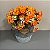ARRANJO COM FLORES LARANJA EM VASO DE CERAMICA - Imagem 1