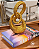 Escultura Abstrato infinito Dourado em Resina 30x16cm - Imagem 1