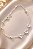 PULSEIRA COM 3 CORAÇÕES ZIRC E DET EM ESFERINHAS - Imagem 1