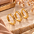 BRINCO TRIO ARGOLA CRAVEJADA ZIRCONIA REDONDAS - Imagem 1