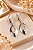 BRINCO CURVO OVAL PENDENTES COM MOVIMENTO PINO E T - Imagem 1