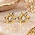 BRINCO FLOR COM PONTO CENTRAL ZIRCONIA 5mm - Imagem 1
