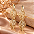 Brinco - BRINCO ORGANICO PENDENTE LONGO FOLHAS, COM PINO E TARRACHA 18K - Imagem 1