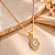 Conjunto - CONJ 2 PÇ GARG VENEZ 45+ PINGENTE MEDALHA PONTO DE LUZ E CRAV ZIRC - Imagem 1