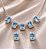 Conjunto - CONJ 3PÇ GARG C 5 PING FIXO PEDRAS RETANG E MICRO ZIRC + BRINCO ZIRC -AZUL CÉU - Imagem 1