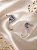 BRINCO EM S COM PEDRA GOTA AQUAMARINHA E CRAV ZIRC - Imagem 1