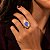 ANEL OVAL C/ ZIRCONIA AZUL CRAVEJADA EM VOLTA - Imagem 2