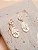 Brinco Moedas - Imagem 1