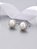 Brinco pérola e Moissanite 1,7mm/ 0.02ct prata 925 com banho de ródio - Imagem 5