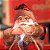 Boneco de Papai Noel Sentado Nó Trenó Vermelho e Preto de 15cm - 1 Un - Imagem 2