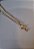 Colar inox dourado masculino com pingente de crucifixo - Imagem 1