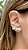 Brinco Ear Cuff com Zircônia Branca e 3 Pétalas - Imagem 4