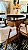 CONJUNTO DE JANTAR AGATHA 130X130 VIDRO PRETO - 6 CADEIRAS POLTRONA LINHO CREME NEVOA - Imagem 7