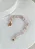 Pulseira Cascalho de Quartzo Rosa com fecho boia - Imagem 2