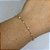 PULSEIRA PÉROLAS PEQUENAS BANHO OURO 18K - Imagem 1