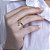 Anel Feminino Dourado com Cristais de Zircônia um Menino Luxuoso - Banhado a ouro 18k - Imagem 5