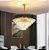 LUSTRE SINDORA DCD03910 METAL PRETO/ CRISTAL TRANSPARENTE 55X36CM E14X9 CABO 1M - Imagem 2