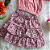 Conjunto Cropped Rosa e Saia Estampada Bebê Rosa tamanho 6 a 9 meses - Imagem 3
