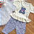 Conjunto Blusa Manga Curta Oncinha Off White e Calça Capri Bebê Lilás tamanho 3 a 6 meses - Imagem 4