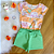 Conjunto Blusa Manga Curta Unicórnio Laranja e Shorts Verde Menina Tamanho 1 - Imagem 1